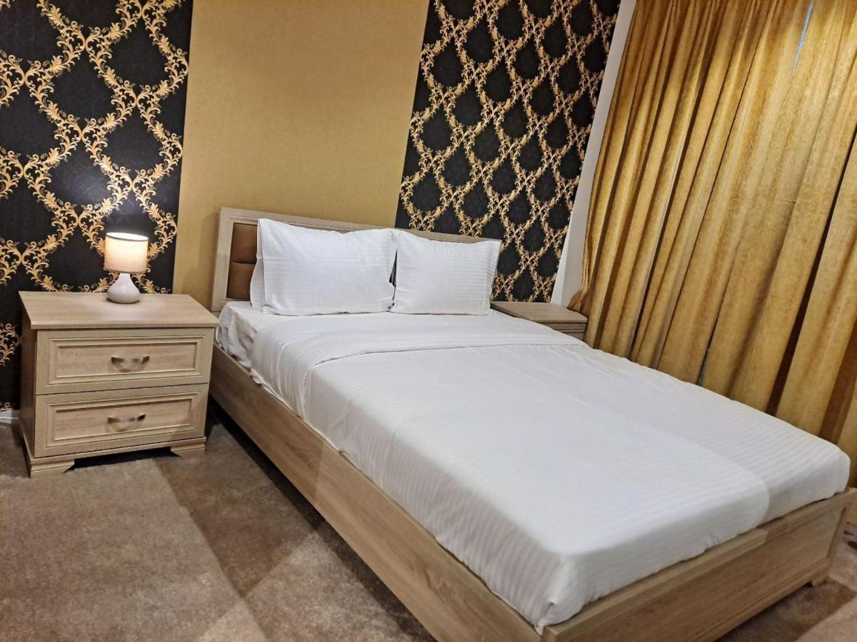 Golden Dahlia Fintas Aparthotel Kuwait City Bagian luar foto